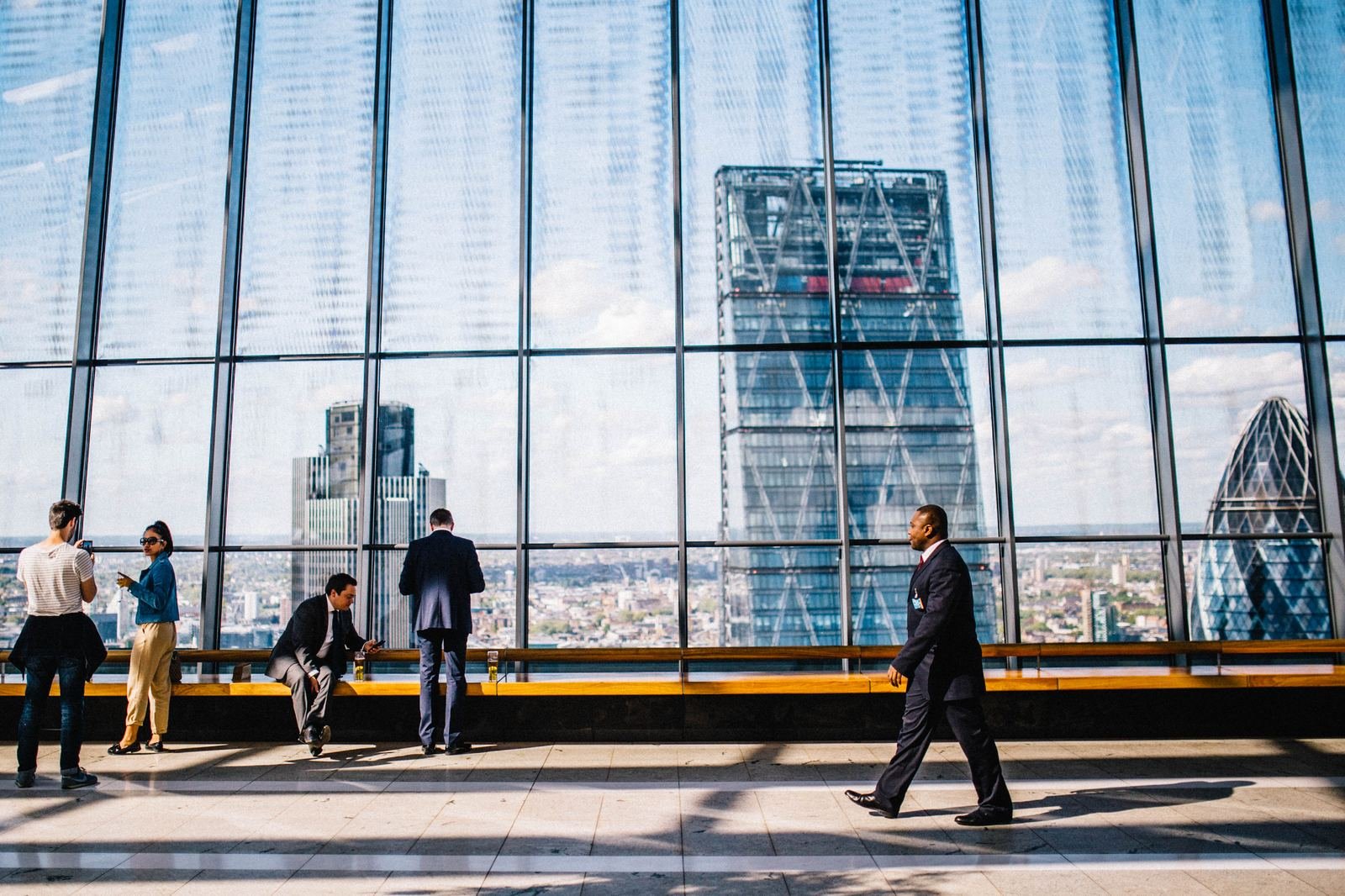 Businesspeople networking in a high-rise office